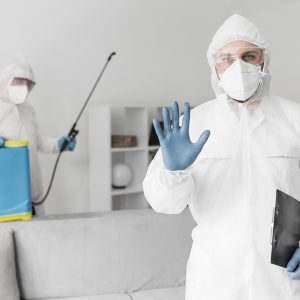 man-with-protective-suit-medium-shot ทำความรู้จักกับ ชุด PPE และอุปกรณ์ PPE คืออะไร มีแบบไหนบ้าง